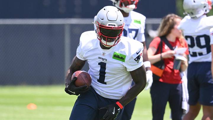 Jun 2, 2026; Foxborough, MA, USA; New England Patriots wide receiver A.J. Brown (1) runs after making a catch during the team's OTA at Gillette Stadium. Mandatory Credit: Eric Canha-Imagn Images