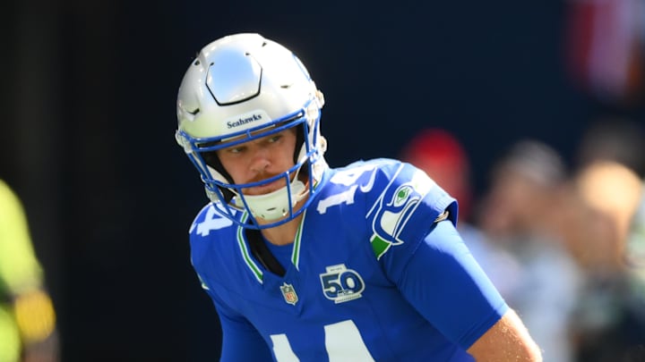 Oct 5, 2025; Seattle, Washington, USA;  Seattle Seahawks quarterback Sam Darnold (14) on the field for warm ups prior to a game against the Tampa Bay Buccaneers at Lumen Field. Mandatory Credit: Steven Bisig-Imagn Images