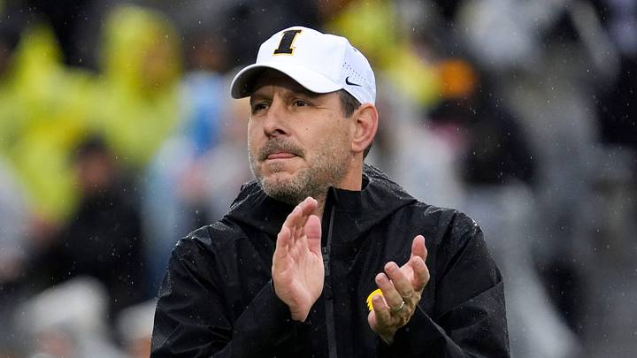 Iowa offensive coordinator Tim Lester watches warm ups Nov. 8, 2025 before a Big Ten Football game against the Oregon Ducks at Kinnick Stadium in Iowa City, Iowa.