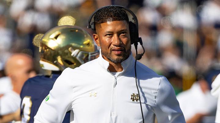 Oct 11, 2025; South Bend, Indiana, USA; Notre Dame Fighting Irish head coach Marcus Freeman looks to the scoreboard against the NC State Wolfpack during the first half at Notre Dame Stadium. Oct 11, 2025; South Bend, Indiana, USA; Notre Dame Fighting Irish head coach Marcus Freeman looks to the scoreboard against the NC State Wolfpack during the first half at Notre Dame Stadium.