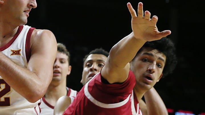 Iowa State Cyclones forward Milan Momcilovic (22) looks for pass as IU Indianapolis Jaguars forward DeSean Goode (2) defends during the second half in the NCAA men’s basketball at Hilton Coliseum on Monday, Nov. 18, 2024, in Ames, Iowa.