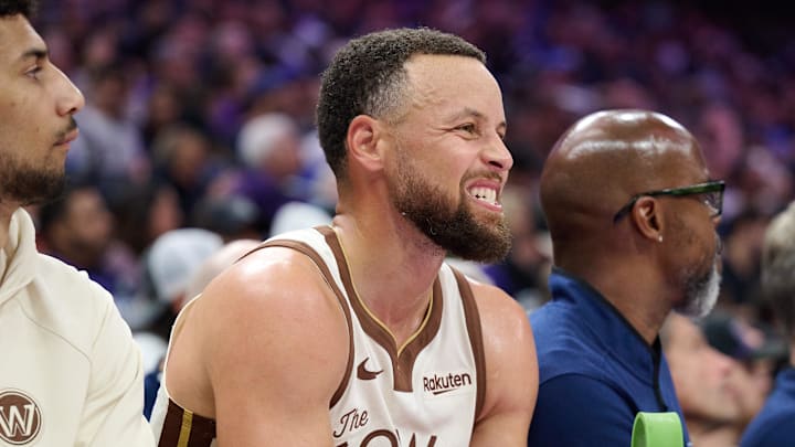 Apr 10, 2026; Sacramento, California, USA; Golden State Warriors guard Stephen Curry (30) reacts on the bench against the Sacramento Kings during the second quarter at Golden 1 Center. Mandatory Credit: Robert Edwards-Imagn Images
