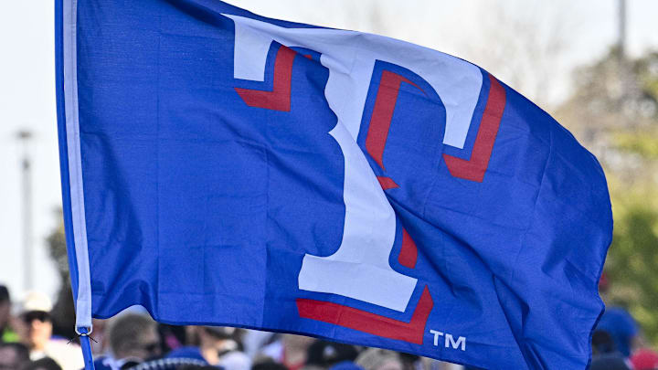 Nov 3, 2023; Arlington, TX, USA; A view of the Texas Rangers fans and flags during the World Series championship parade at Globe Life Field. Mandatory Credit: Jerome Miron-Imagn Images