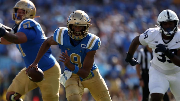 Oct 4, 2025; Pasadena, California, USA;  UCLA Bruins quarterback Nico Iamaleava (9) runs for a touchdown during the fourth quarter against the Penn State Nittany Lions at Rose Bowl. Mandatory Credit: Kiyoshi Mio-Imagn Images