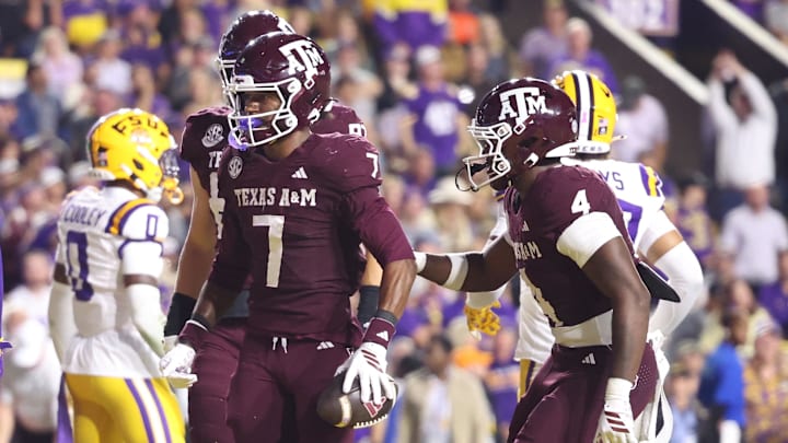 Texas A&M Aggies wide receiver KC Concepcion (7) celebrates with teammates after a touchdown during the first half against the Louisiana State Tigers at Tiger Stadium. Texas A&M Aggies wide receiver KC Concepcion (7) celebrates with teammates after a touchdown during the first half against the Louisiana State Tigers at Tiger Stadium.