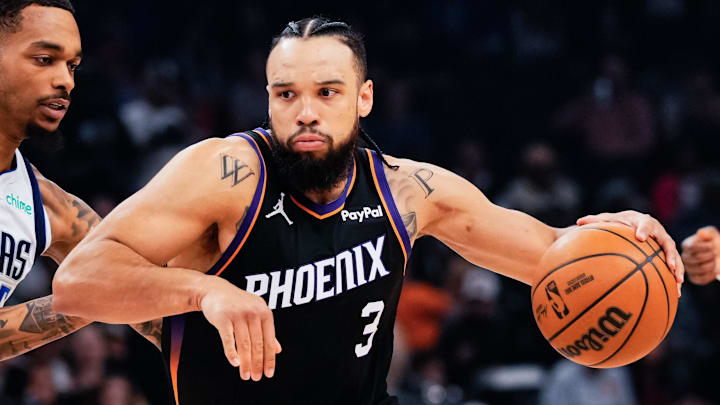 Feb 10, 2026; Phoenix, Arizona, USA; Phoenix Suns guard/forward Dillon Brooks (3) goes against Dallas Mavericks forward P.J. Washington (25) during the first half the game at Mortgage Matchup Center. Mandatory Credit: Arianna Grainey-Imagn Images