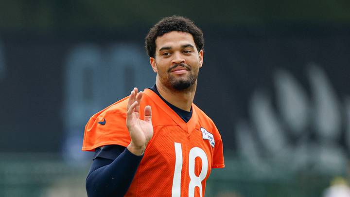 Chicago Bears quarterback Caleb Williams stands on the field during training camp at Halas Hall. Mandatory Credit: Kamil Krzaczynski-Imagn Images