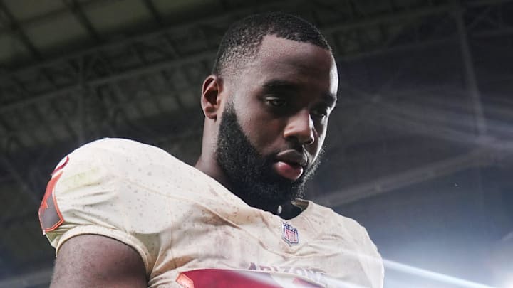 Arizona Cardinals running back Trey Benson (33) walks off the field after their 23-20 loss to the Seattle Seahawks at State Farm Stadium in Glendale on Sept. 25, 2025. Arizona Cardinals running back Trey Benson (33) walks off the field after their 23-20 loss to the Seattle Seahawks at State Farm Stadium in Glendale on Sept. 25, 2025.