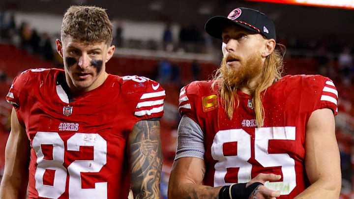 San Francisco 49ers tight end George Kittle (85) and former tight end Eric Saubert (82) after the game against the Detroit Lions at Levi's Stadium.