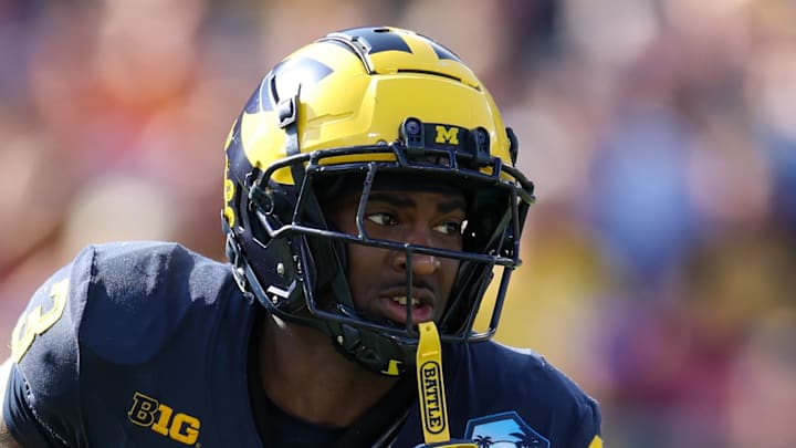 Dec 31, 2024; Tampa, FL, USA; Michigan Wolverines wide receiver Fredrick Moore (3) runs with the ball against the Alabama Crimson Tide  in the third quarter  during the ReliaQuest Bowl at Raymond James Stadium. Mandatory Credit: Nathan Ray Seebeck-Imagn Images