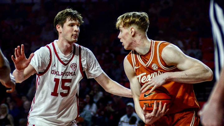 Oklahoma center Kirill Elatontsev defends against Texas.
