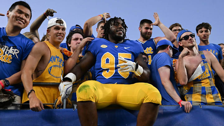 Sep 14, 2024; Pittsburgh, Pennsylvania, USA; Pittsburgh Panthers defensive lineman Francis Brewu (95) celebrates after defeating the West Virginia Mountaineers at Acrisure Stadium. Mandatory Credit: Barry Reeger-Image Images