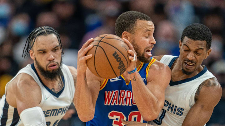 Dec 23, 2021; San Francisco, California, USA; Memphis Grizzlies forward Dillon Brooks (24) and guard De'Anthony Melton (0) pressure Golden State Warriors guard Stephen Curry (30) during the third quarter at Chase Center. Mandatory Credit: Neville E. Guard-Imagn Images
