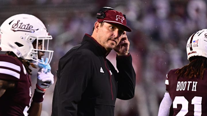 Mississippi State Bulldogs coach Jeff Lebby speaks with players between plays against the Eastern Kentucky Colonels during the third quarter at Davis Wade Stadium at Scott Field.