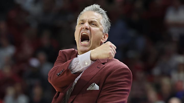 Arkansas Razorbacks coach John Calipari reacts to a call in the second half against the Oklahoma Sooners at Bud Walton Arena on Saturday night. The Hogs overcame a 13-point deficit in the first half to lead by six with 10 minutes left but lost 65-62.