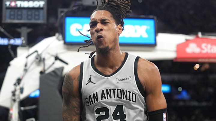 Apr 8, 2026; San Antonio, Texas, USA; San Antonio Spurs guard Devin Vassell (24) reacts after getting fouled while attempting to dunk during the first half against the Portland Trail Blazers at Frost Bank Center. Mandatory Credit: Scott Wachter-Imagn Images