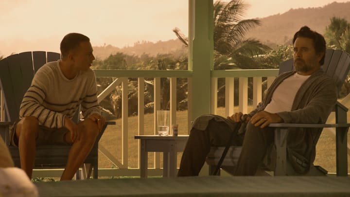Outer Banks. (L to R) Drew Starkey as Rafe, Charles Esten as Ward Cameron in episode 303 of Outer Banks. Cr. Courtesy of Netflix © 2022