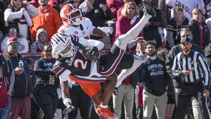 South Carolina defensive back Jalon Kilgore (24) intercepts a pass meant for Clemson running back Adam Randall (8) during the first quarter at Williams-Brice Stadium in Columbia, S.C. on Saturday, November 29, 2025.
