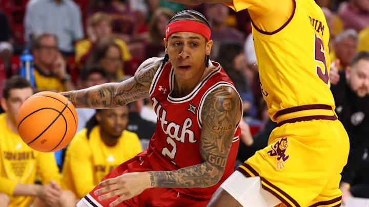 Feb 28, 2026; Tempe, Arizona, USA; Utah Utes guard Terrence Brown (2) against Arizona State Sun Devils guard Maurice Odum (5) in the first half at Desert Financial Arena. Mandatory Credit: Mark J. Rebilas-Imagn Images