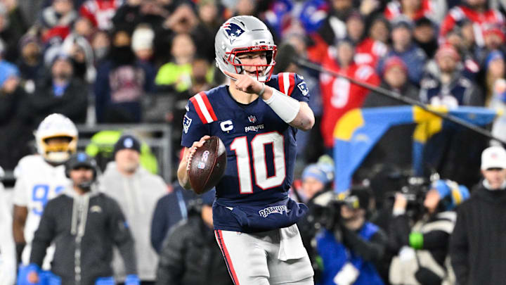 Jan 11, 2026; Foxborough, MA, USA; New England Patriots quarterback Drake Maye (10) looks to pass during the second quarter against the Los Angeles Chargers in an AFC Wild Card Round game at Gillette Stadium. Mandatory Credit: Eric Canha-Imagn Images Jan 11, 2026; Foxborough, MA, USA; New England Patriots quarterback Drake Maye (10) looks to pass during the second quarter against the Los Angeles Chargers in an AFC Wild Card Round game at Gillette Stadium. Mandatory Credit: Eric Canha-Imagn Images