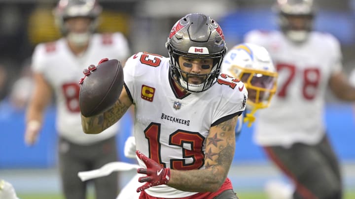 Dec 15, 2024; Inglewood, California, USA; Tampa Bay Buccaneers wide receiver Mike Evans (13) runs for a touchdown on a 35 yard pass play in the second half against the Los Angeles Chargers at SoFi Stadium. Mandatory Credit: Jayne Kamin-Oncea-Imagn Images