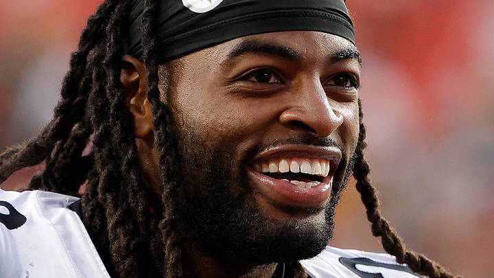 Former Pittsburgh Steelers running back Najee Harris (22) smiling