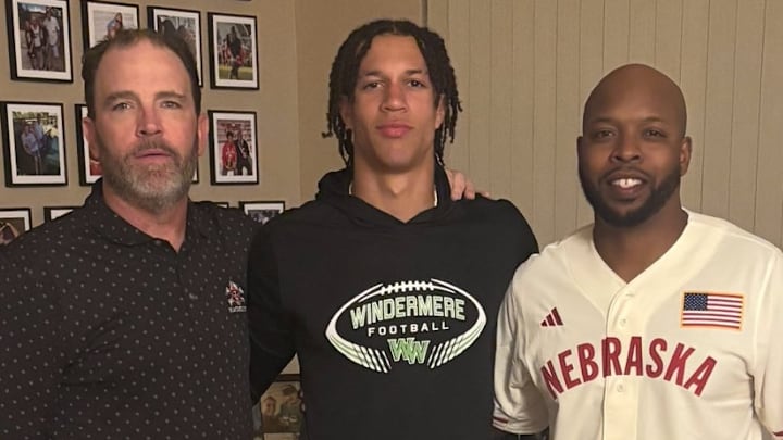 CJ Bronaugh with Nebraska defensive coordinator John Butler, left, and defensive backs coach Addison Williams during a recent in-home visit.