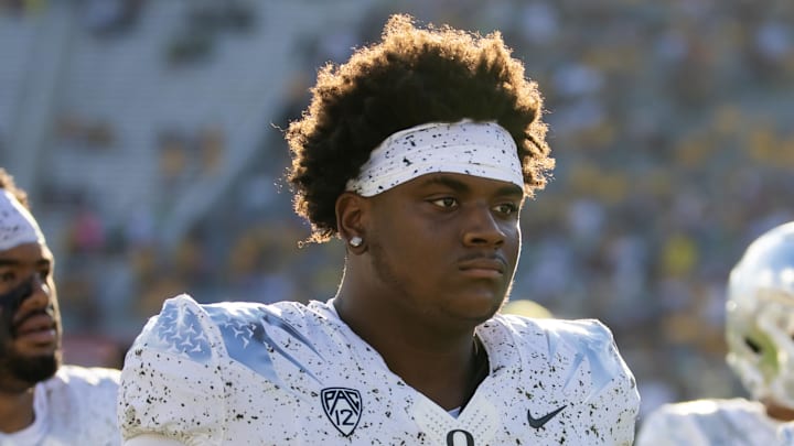 Nov 18, 2023; Tempe, Arizona, USA; Oregon Ducks defensive lineman A'Mauri Washington (58) against the Arizona State Sun Devils at Mountain America Stadium. Mandatory Credit: Mark J. Rebilas-Imagn Images Nov 18, 2023; Tempe, Arizona, USA; Oregon Ducks defensive lineman A'Mauri Washington (58) against the Arizona State Sun Devils at Mountain America Stadium. Mandatory Credit: Mark J. Rebilas-Imagn Images