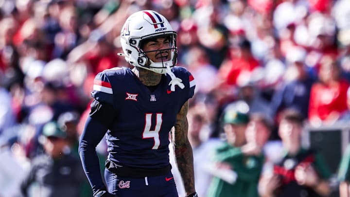 Nov 22, 2025; Tucson, Arizona, USA; Arizona Wildcats wide receiver Kris Hutson (4) celebrates a catch he made during the first quarter of the game against the Baylor Bears at Casino Del Sol Stadium. Mandatory Credit: Aryanna Frank-Imagn Images