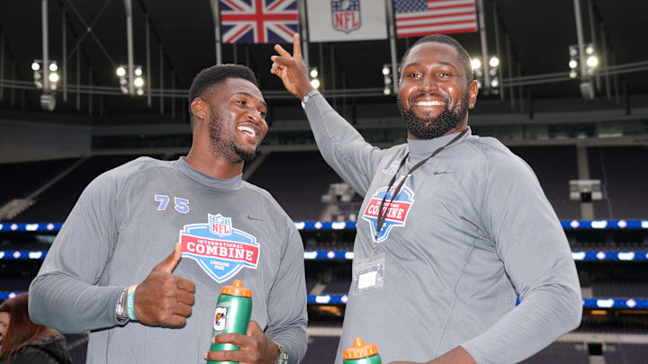Oct 12, 2021; London, United Kingdom; Haggai Chisom Noubuisi of Nigeria (75) and Mbaeteka Chigbo Roy of Nigeria (76) pose during the NFL International Combine at Tottenham Hotspur Stadium. Mandatory Credit: Kirby Lee-Imagn Images Oct 12, 2021; London, United Kingdom; Haggai Chisom Noubuisi of Nigeria (75) and Mbaeteka Chigbo Roy of Nigeria (76) pose during the NFL International Combine at Tottenham Hotspur Stadium. Mandatory Credit: Kirby Lee-Imagn Images