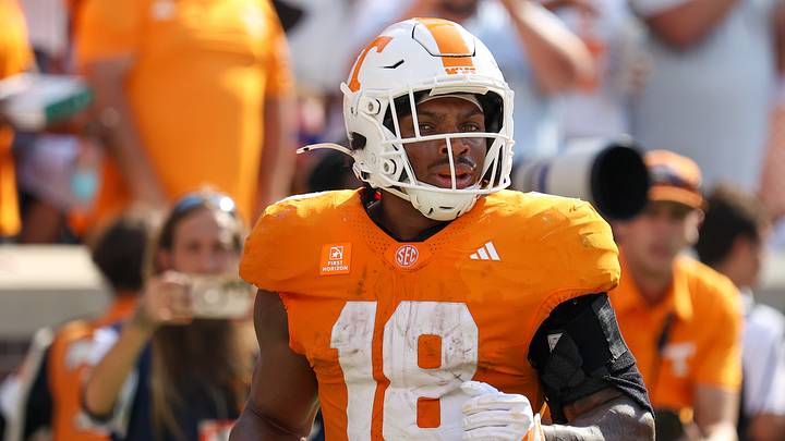 Sep 5, 2026; Knoxville, Tennessee, USA;  Tennessee Volunteers running back DeSean Bishop (18) scores a touchdown against the Furman Paladins during the first half at Neyland Stadium.  Mandatory Credit: Randy Sartin-Imagn Images