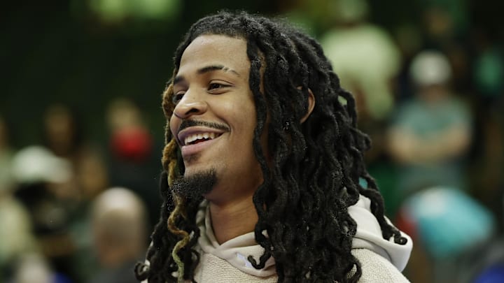 Mar 21, 2026; Charlotte, North Carolina, USA; Memphis Grizzlies guard Ja Morant stands on the court following the game against the Charlotte Hornets at Spectrum Center. Mandatory Credit: Brian Westerholt-Imagn Images