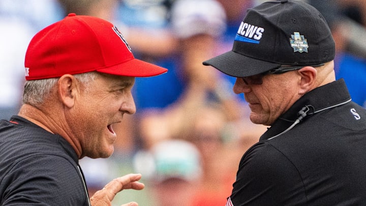 Jun 15, 2024; Omaha, NE, USA; NC State Wolfpack head coach Elliott Avent talks with an official during the seventh inning against the Kentucky Wildcats at Charles Schwab Field Omaha. Mandatory Credit: Dylan Widger-Imagn Images Jun 15, 2024; Omaha, NE, USA; NC State Wolfpack head coach Elliott Avent talks with an official during the seventh inning against the Kentucky Wildcats at Charles Schwab Field Omaha. Mandatory Credit: Dylan Widger-Imagn Images