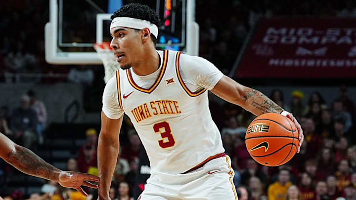 Iowa State Cyclones guard Tamin Lipsey (3) looks for a drive around Oklahoma State Cowboys guard Kanye Clary (1) and Oklahoma State Cowboys forward Parsa Fallah (22) during the first half in the Big-12 men’s basketball on Jan. 10, 2026, at Hilton Coliseum in Ames, Iowa.