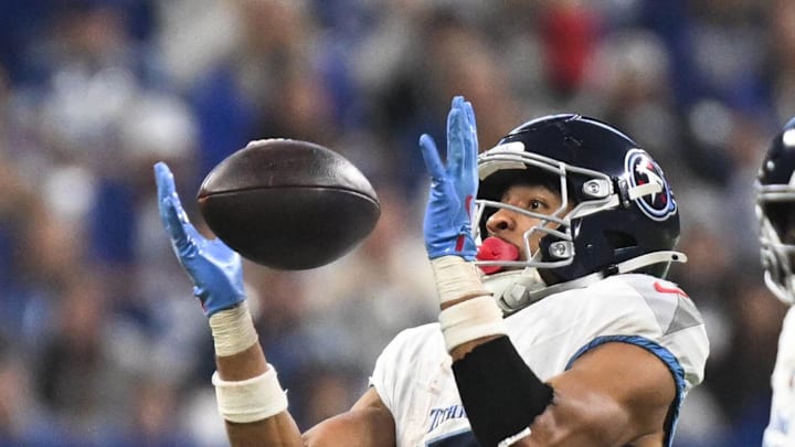 Tennessee Titans wide receiver Chimere Dike catches a pass during the second quarter against the Indianapolis Colts. Tennessee Titans wide receiver Chimere Dike catches a pass during the second quarter against the Indianapolis Colts.