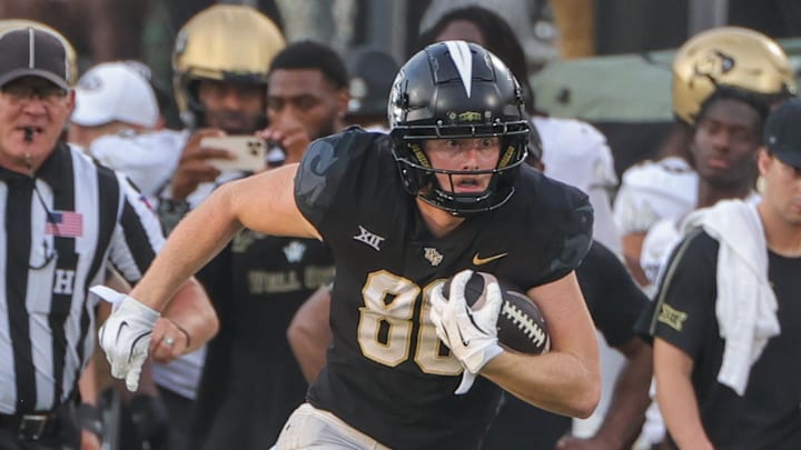 Sep 28, 2024; Orlando, Florida, USA; UCF Knights wide receiver Trent Whittemore (80) runs during the second half against the Colorado Buffaloes at FBC Mortgage Stadium. Mandatory Credit: Mike Watters-Imagn Images