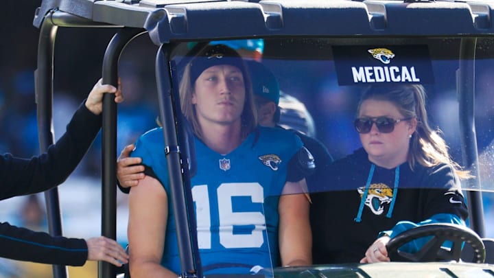 Jacksonville Jaguars quarterback Trevor Lawrence (16) is carted off the field after sustaining a heavy hit during the second quarter of an NFL football matchup Sunday, Dec. 1, 2024 at EverBank Stadium in Jacksonville, Fla. [Corey Perrine/Florida Times-Union]