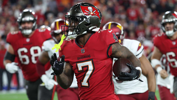 Tampa Bay Buccaneers running back Bucky Irving runs during the third quarter of a NFC wild card playoff.