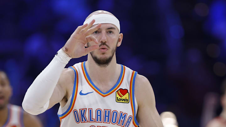 Feb 7, 2026; Oklahoma City, Oklahoma, USA; Oklahoma City Thunder guard Alex Caruso (9) gestures after scoring against the Houston Rockets during the second half at Paycom Center. Mandatory Credit: Alonzo Adams-Imagn Images