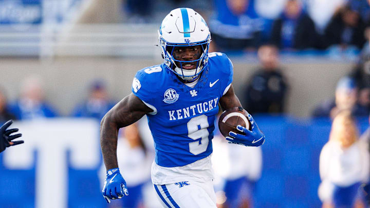 Nov 16, 2024; Lexington, Kentucky, USA; Kentucky Wildcats wide receiver Ja'Mori Maclin (9) runs the ball during the third quarter against the Murray State Racers at Kroger Field. Mandatory Credit: Jordan Prather-Imagn Images
