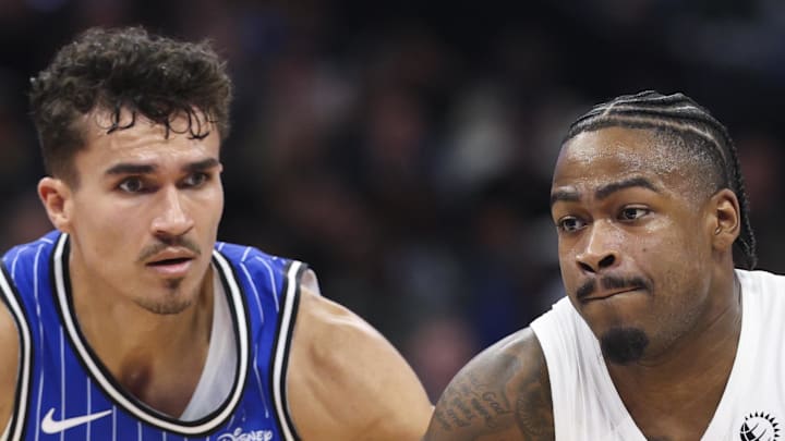 Toronto Raptors guard Jamal Shead moves the ball past Orlando Magic forward Tristan da Silva.