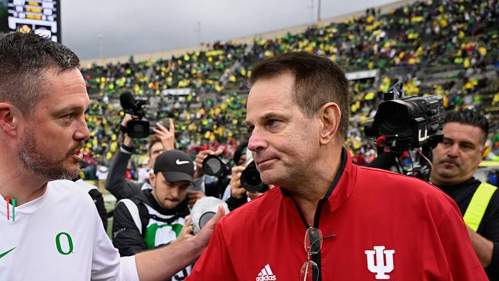 Oct 11, 2025; Eugene, Oregon, USA; Oregon Ducks head coach Dan Lanning shakes hands with Indiana Hoosiers head coach Curt Cignetti after Indiana defeated Oregon by the score of 30-20 at Autzen Stadium. Mandatory Credit: Troy Wayrynen-Imagn Images
