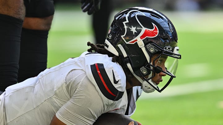 Sep 22, 2024; Minneapolis, Minnesota, USA; Houston Texans quarterback C.J. Stroud (7) in action against the Minnesota Vikings during the game at U.S. Bank Stadium. Mandatory Credit: Jeffrey Becker-Imagn Images