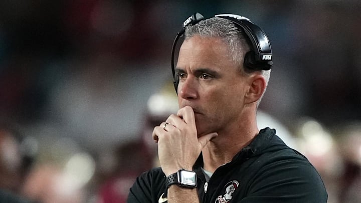 Dec 30, 2023; Miami Gardens, FL, USA; Florida State Seminoles head coach Mike Norvell reacts against the Georgia Bulldogs during the second half in the 2023 Orange Bowl at Hard Rock Stadium. Mandatory Credit: Jasen Vinlove-Imagn Images