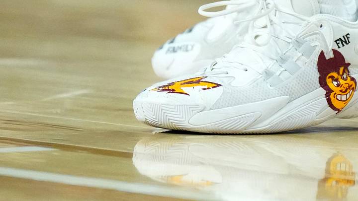 Mar 13, 2024; Las Vegas, NV, USA; The Adidas shoes with Arizona State Sun Devils mascot Sparky logo worn by Sun Devils guard Frankie Collins (1) in the second half against the Utah Utes at the T-Mobile Arena. Mandatory Credit: Kirby Lee-Imagn Images