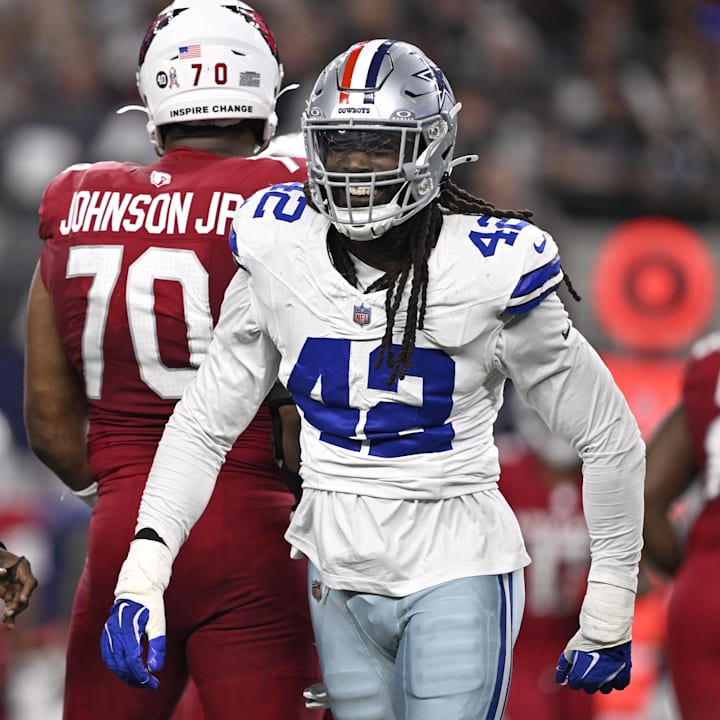 \Dallas Cowboys defensive end Jadeveon Clowney reacts after a sack against Arizona Cardinals quarterback Jacoby Brissett.