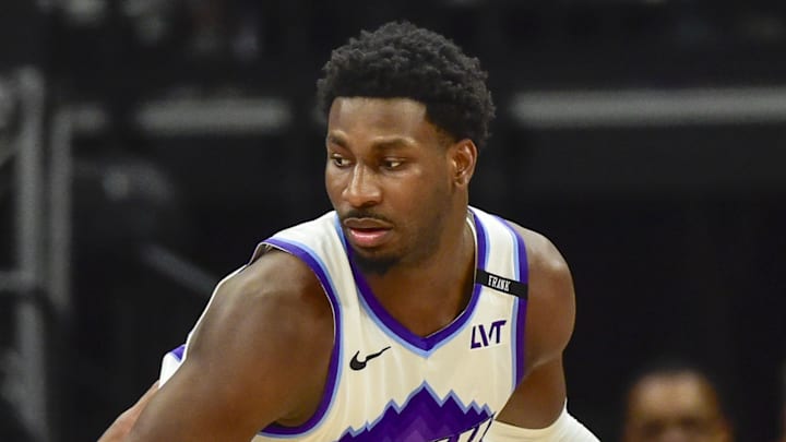Feb 11, 2026; Salt Lake City, Utah, USA; Utah Jazz forward Jaren Jackson Jr. (20) plans his next move around Sacramento Kings guard/forward DeMar DeRozan (10) during the first half at Delta Center. Mandatory Credit: Peter Creveling-Imagn Images