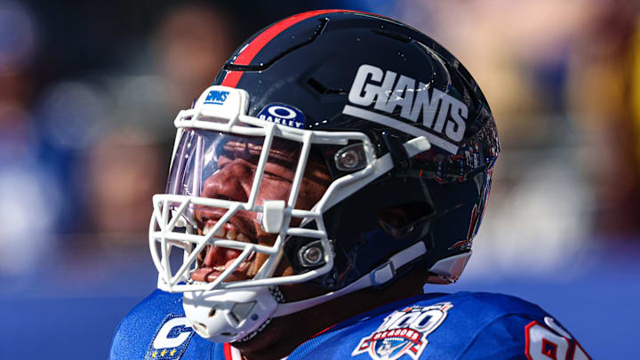 Nov 3, 2024; East Rutherford, New Jersey, USA; New York Giants defensive tackle Dexter Lawrence II (97) reacts during introductions before the game against the Washington Commanders at MetLife Stadium. Mandatory Credit: Vincent Carchietta-Imagn Images
