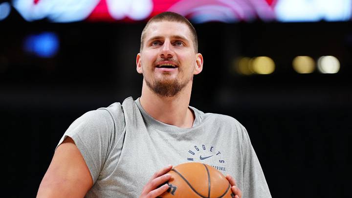 Dec 28, 2024; Denver, Colorado, USA; Denver Nuggets center Nikola Jokic (15) warms up before the game against the Detroit Pistons at Ball Arena. Mandatory Credit: Ron Chenoy-Imagn Images