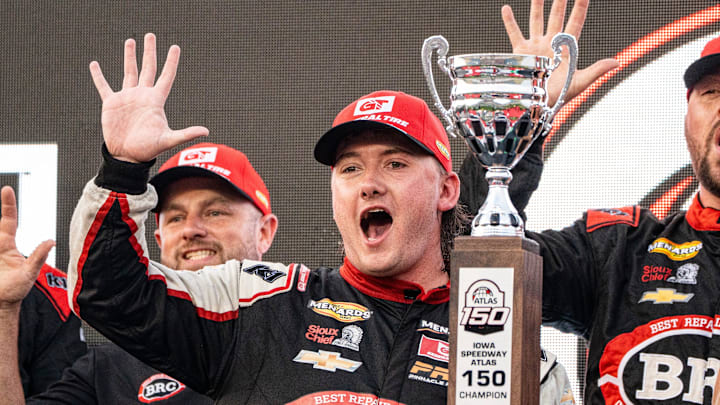 Brenden Queen (28) and crew members celebrate in victory lane after the ARCA Menards Series Atlas Roofing 150 on Aug. 1, 2025, at Iowa Speedway in Newton, Iowa. Queen (28) finished first.